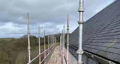 Repairs to a traditional slated roof by MRS Roofing Services.